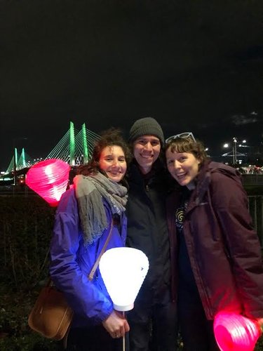 Snuggling up to Sarbear as we light the night!