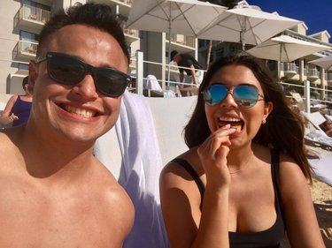 Maribel having her favorite snack in the Cayman Islands