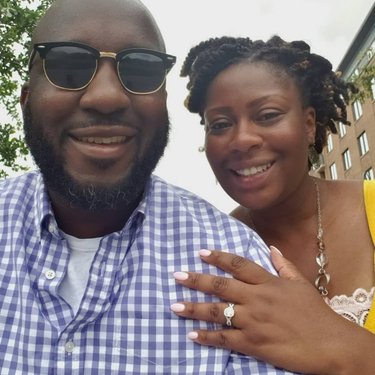 First pose as an engaged couple