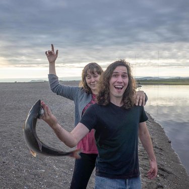 Rick finally caught a fish!!  Midnight fishing in Nome, AK