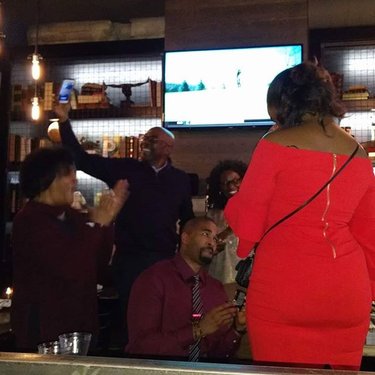 John's mom and Jamila's parents cheer us on in the background.