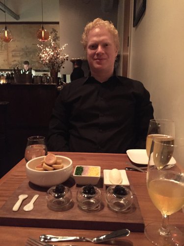 On our first trip together in Portland OR, March 2016 - having a fancy dinner& Laura tries caviar for the first time
